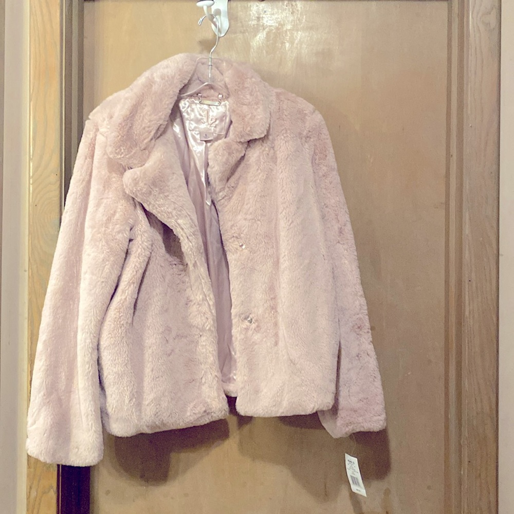 Light pink women’s coat with satin lining. New